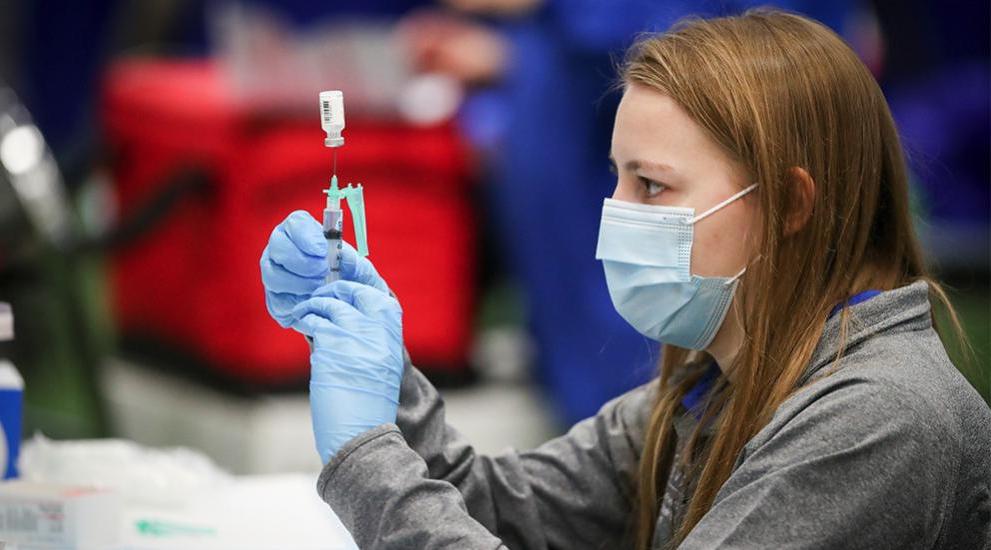 student-filling-syringe